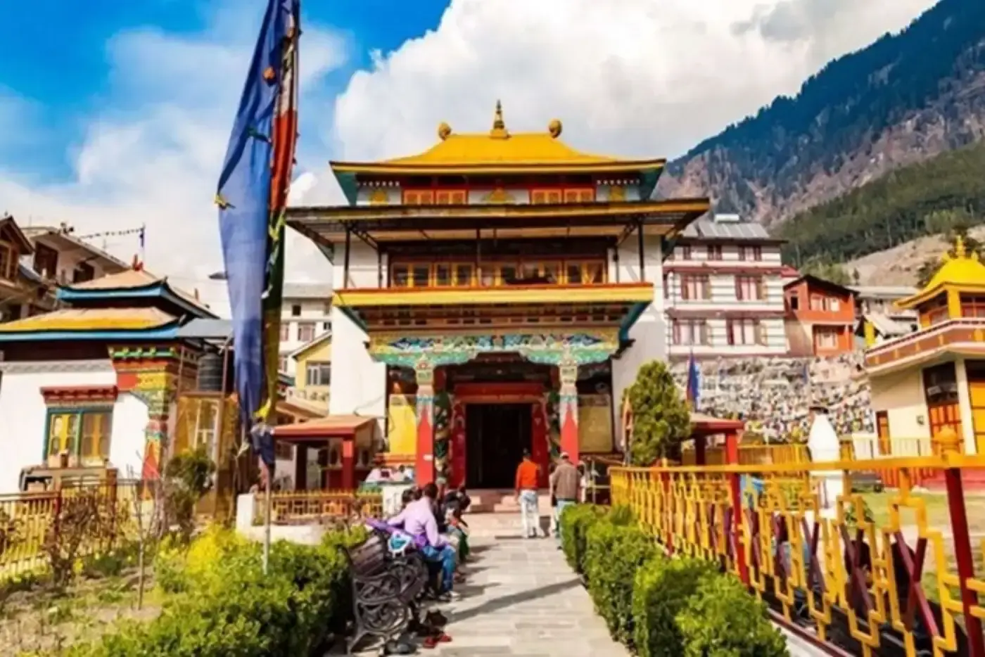 Kyichu Monastery in the Himalayas, featuring colorful architecture and prayer flags.